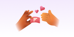 Hands sharing a referral ticket