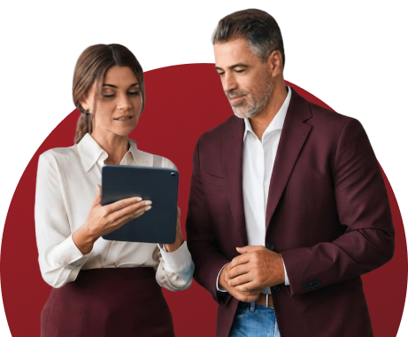 A banker and an NRI customer reviewing GIFT City deposit options on a tablet